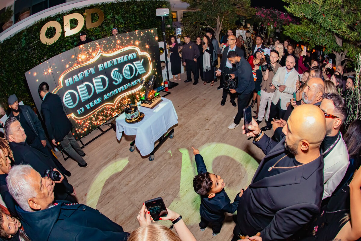 DJ entertaining guests on the dance floor at a corporate celebration planned by Pop, Sip & Celebrate Planning in Tampa Bay.